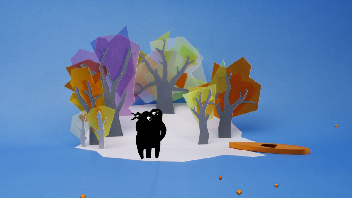 Kadr animacji ukazujący dwie przytulone postacie na małej wyspie z drzewami oraz łódką przy brzegu